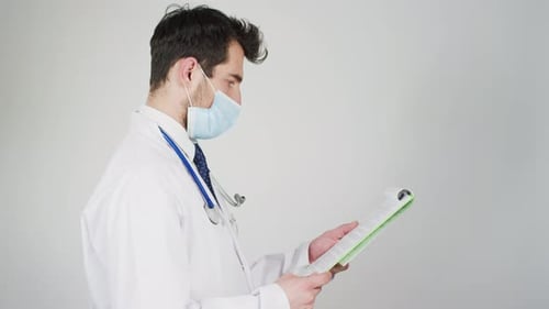 A doctor reading
