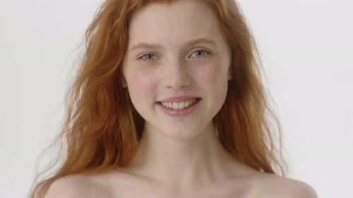 Smiling Woman with Red Hair Close Up Portrait
