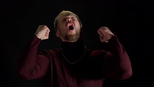 Man Yelling and Appearing Excited