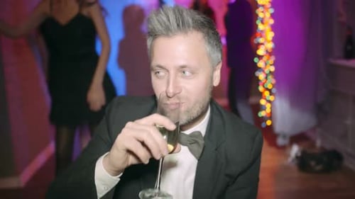 Adults Celebrating Birthday Party with Champagne at Night