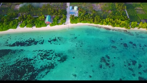 Aerial drone view seascape of idyllic coastline beach vacation by blue water with bright sand backgr