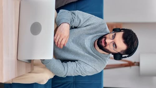 Man Working on Computer at Home