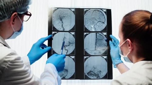 Doctors Examining Xraybrain MRI