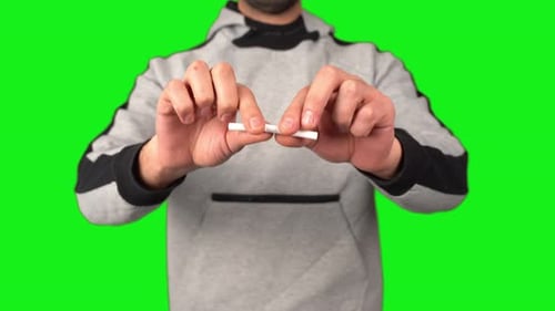 cigarette green screen Hand Holding A Background Stock video Footage green screen cigarette smoke Realistic