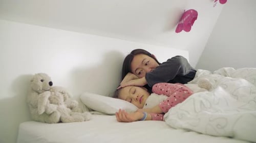 Mother Watching over Sleeping Child with Tenderness