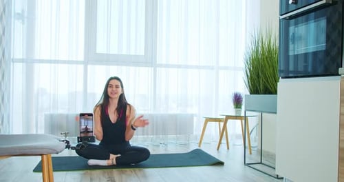 Young Woman Presents Home Fitness Routine