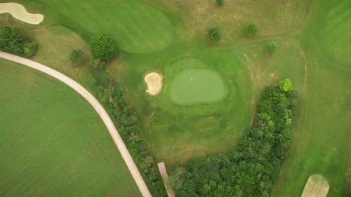 Top aerial view of green golf course