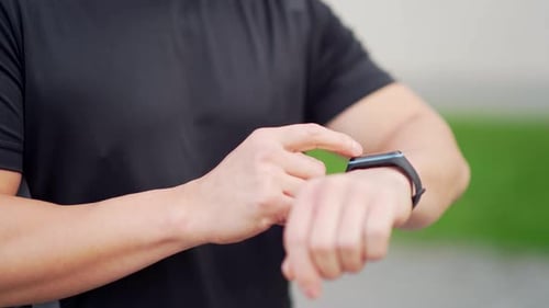 Man Uses Smart Watch Close Up