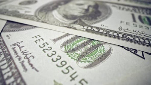 American One Hundred Dollar Paper Banknote Pile on Office Desk