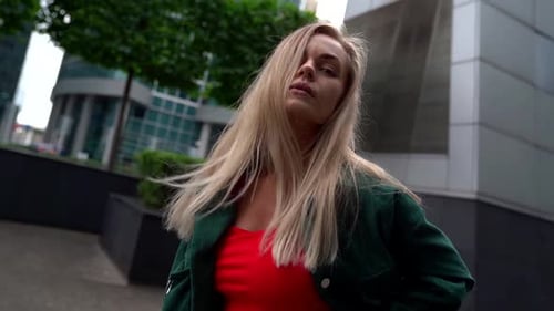 Young Slim Woman Is Wearing Casual Street Style Clothes Is Walking in Modern City