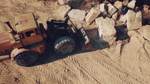 Specially Equipped Bulldozer With a Jug is Picking Stone
