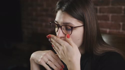 A Young Girl Works at the Computer
