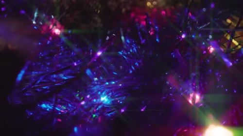 Colorful Tinsel Shimmers with Christmas Lights