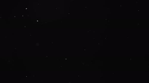 Abstract Black Backdrop with Flecks and Central Logo