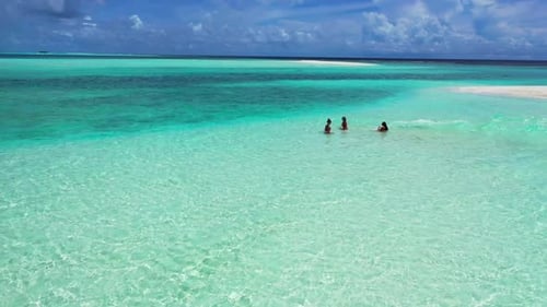 Ladies together best friends on luxury seashore beach break by blue ocean and white sand background