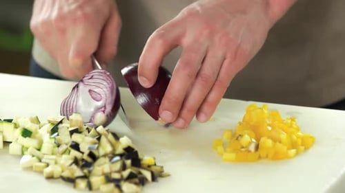 Dicing Red Onion and Other Vegetables on Board