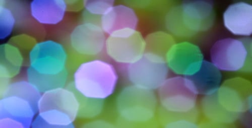 Abstract Bokeh Lights Background with Green Blue Purple