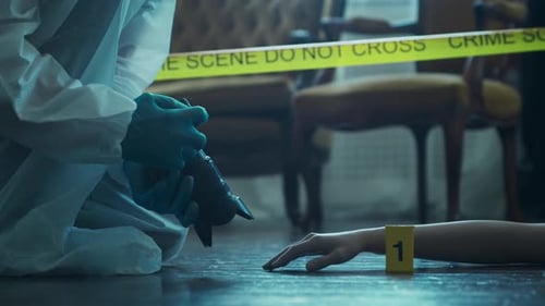 Forensic Investigator Documents Crime Scene Evidence