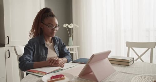 Woman Having Video Call on Tablet at Home