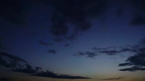 Rolling Dark Clouds at Sunset Time Lapse