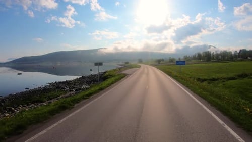 Vehicle Point-of-view Driving a Car on a Road in Norway