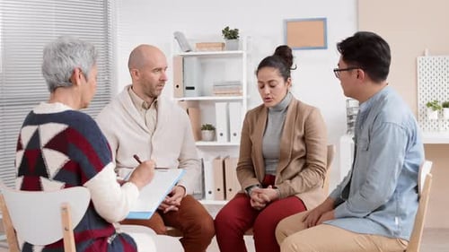 Support Group Meeting in a Bright Office Space