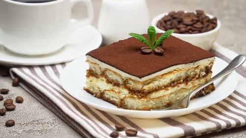Tiramisu Cake with Coffee Cup and Beans