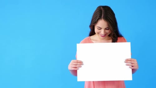 Young Woman Holding Blank Sign with Copy Space