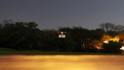Modern Drone Package Delivery at Night