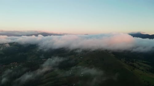 Aerial View of Foggy Sunrise in the Mountains