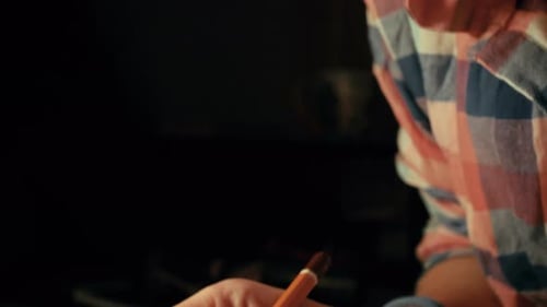 Hand Drawing in a Sketchbook with Pencil