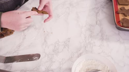 Hands Baking Christmas Gingerbread Cookies