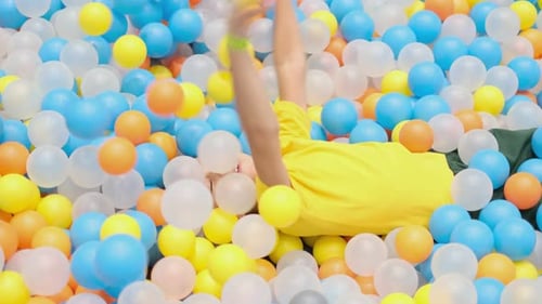 Boy Playing in Playground Colourful Ball Pool