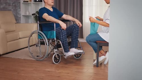 Senior Man Exercising with Resistance Band