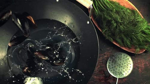 Mussels Dropped in Water with Fresh Dill