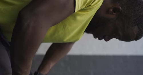 Athletic Man Resting After Intense Workout Session