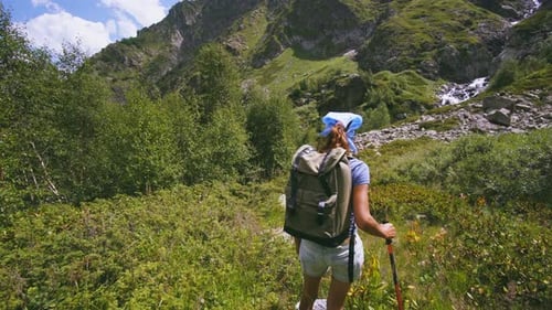 Woman Backpacker Hiking In Mountain 003