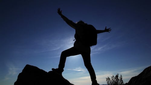 Woman Overcomes Difficult Mountain
