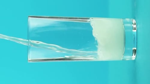 Liquid Being Poured Into a Glass