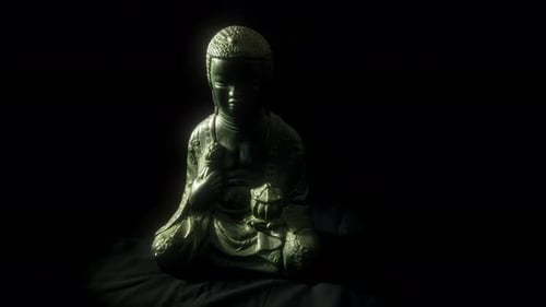Holy Buddha statue sitting in meditation