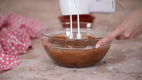 Mixer Blending Batter in Bowl