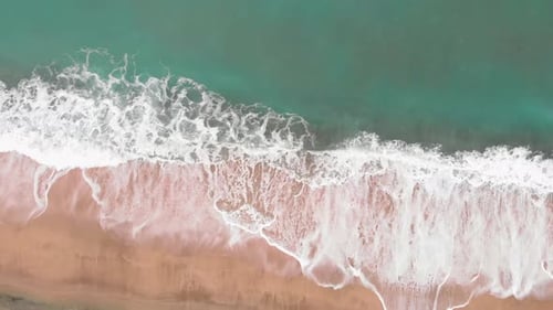 Sea waves and beautiful sand beach top view