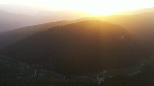 Majestic Mountains at Sunrise or Sunset Aerial View
