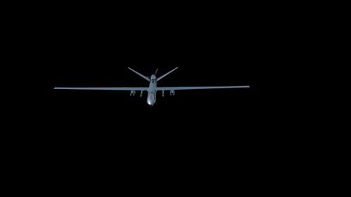 Military Predator Drone UAV with Missiles Flying on Black