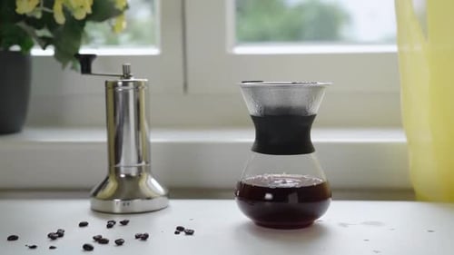 Coffee Carafe with Manual Grinder on Counter