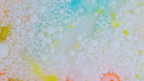 Abstract Footage of Colorful Microscopic Orbs