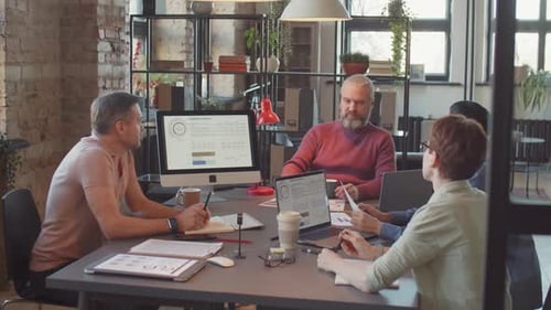 Business Team Working on Project at Office Meeting