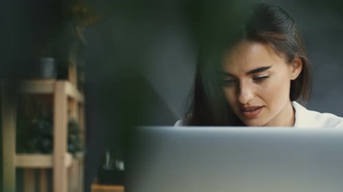 Pretty Female Freelnacer Working Cafe with Laptop and Smiling