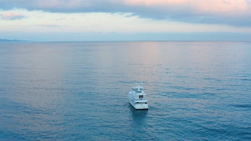 Private Yacht Sailing on a Calm Blue Ocean