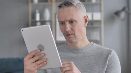 Man Reacting to Online Trading Loss